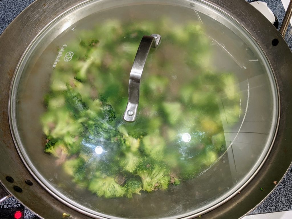 mapo tofu beef and broccoli with a lid