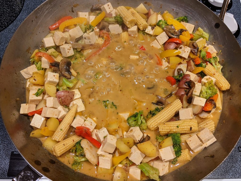 Simple Thai curry with tofu simmering