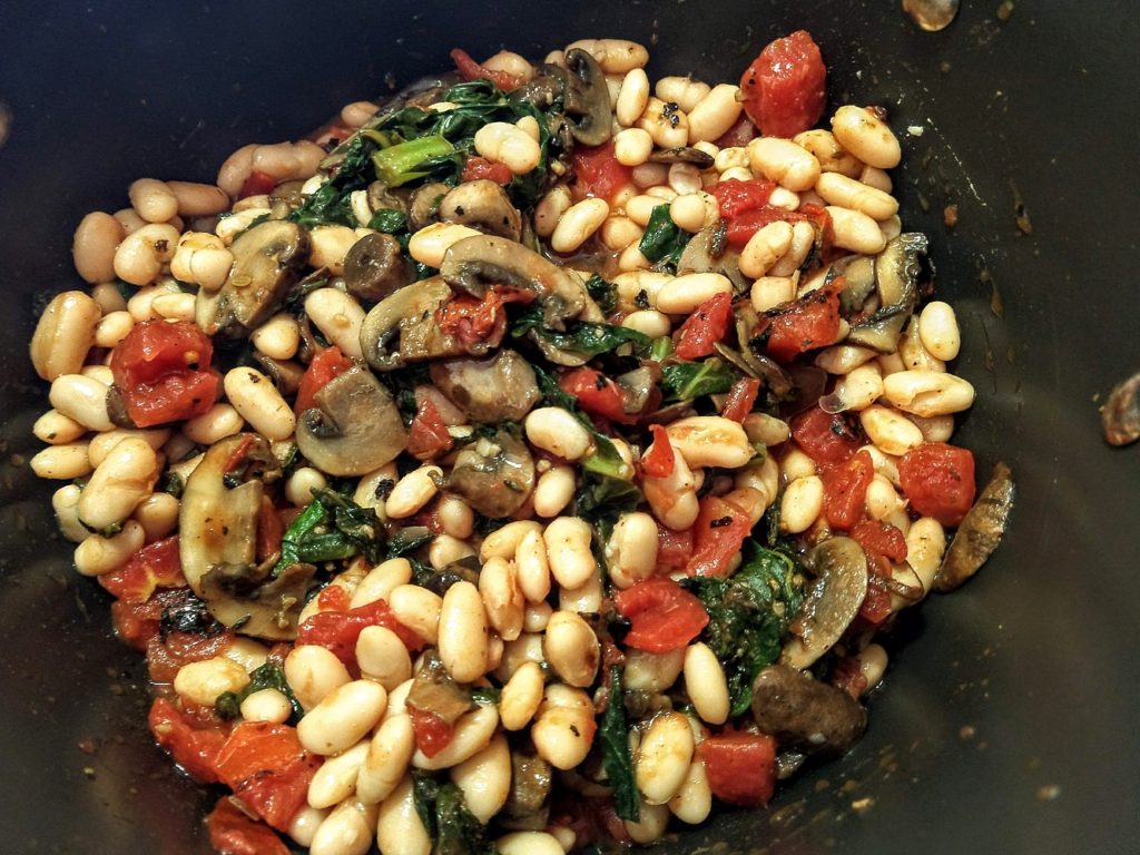 great northern bean stew with mushies, greens, and tomatoes